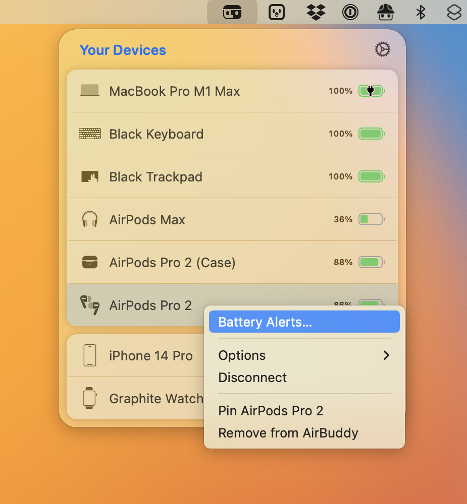 A device on the list is right-clicked, showing a menu with the option to create a battery alert